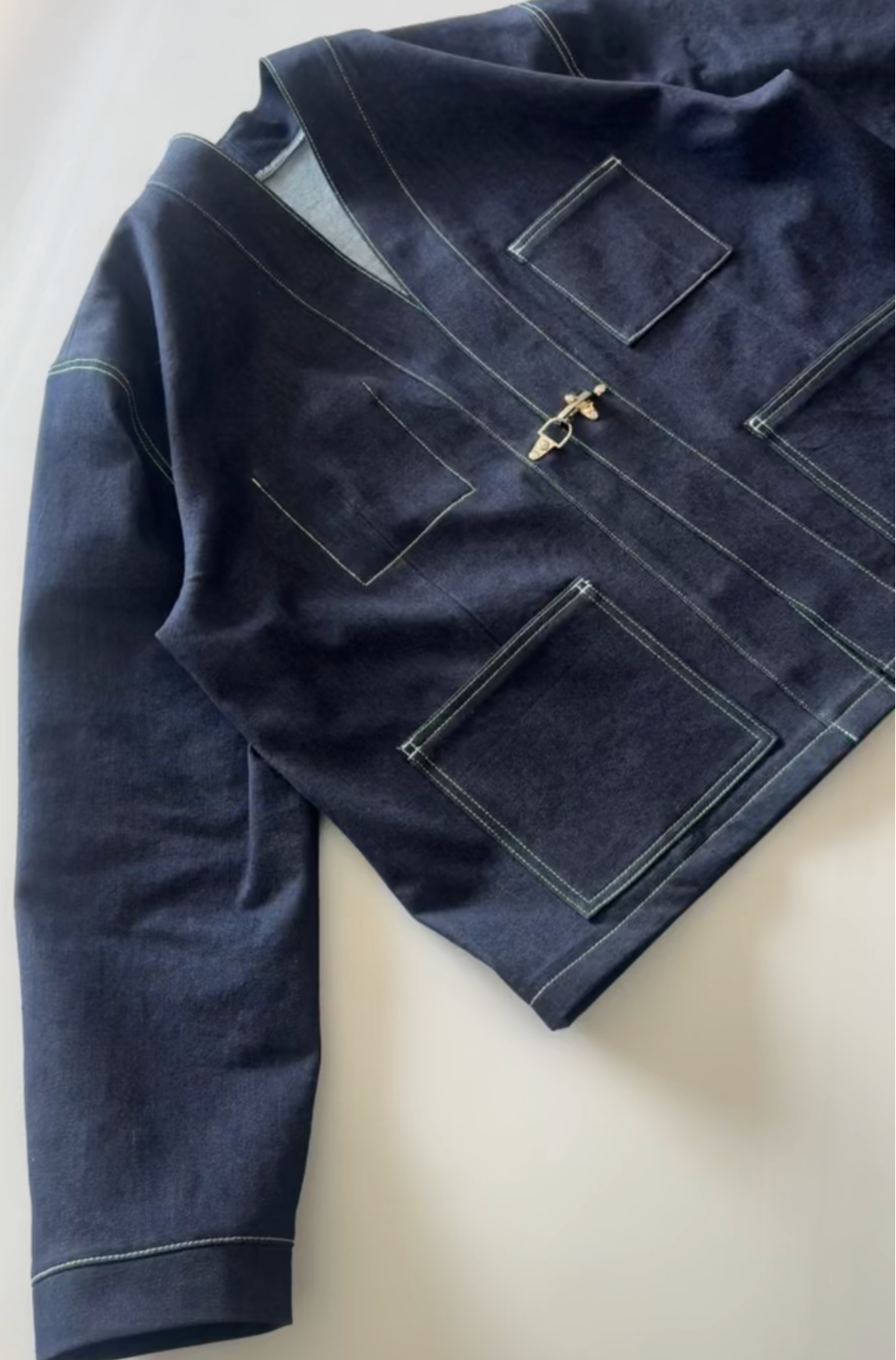 Navy blue jacket on a white background